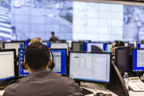 Man in a dispatch center